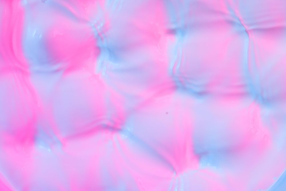 Ripples lit with vibrant bold gradient holographic colors