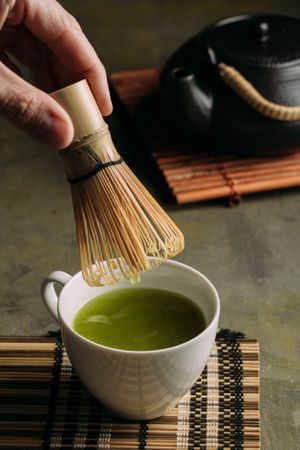 Preparing matcha tea