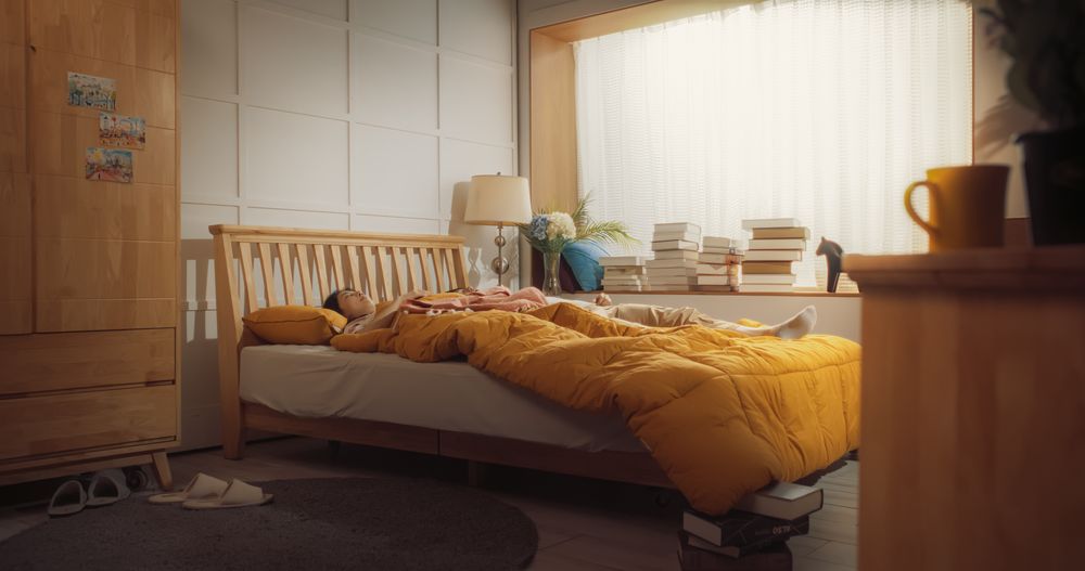 Young Korean Couple Together in the Bed Sleeping During Early Morning.
