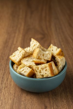 Delicious crunchy croutons on the table.