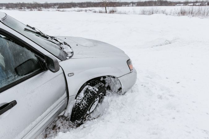 Car driving on snow field