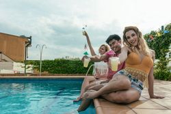 Group of friends having a pool party