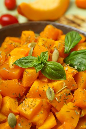 Concept of tasty homemade dish - baked pumpkin