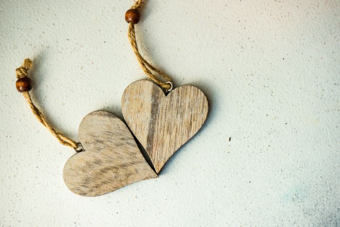 Valentine's day concept with two wooden heart decorations 