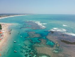 Aerial shot of ocean and beach of Porto de Galinhas