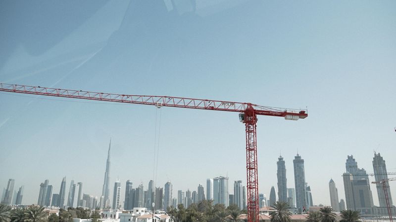 Red crane near city of Dubai