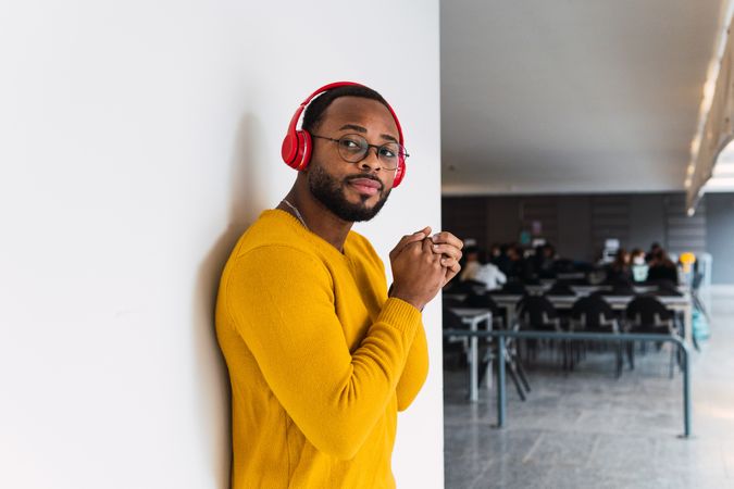 Black man listening to music in headphones