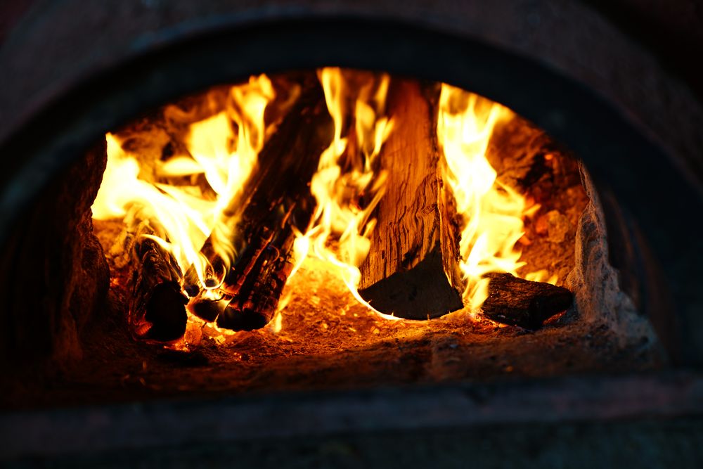 Burning fireplace with logs