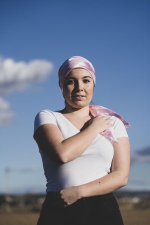 Young woman with cancer headscarf
