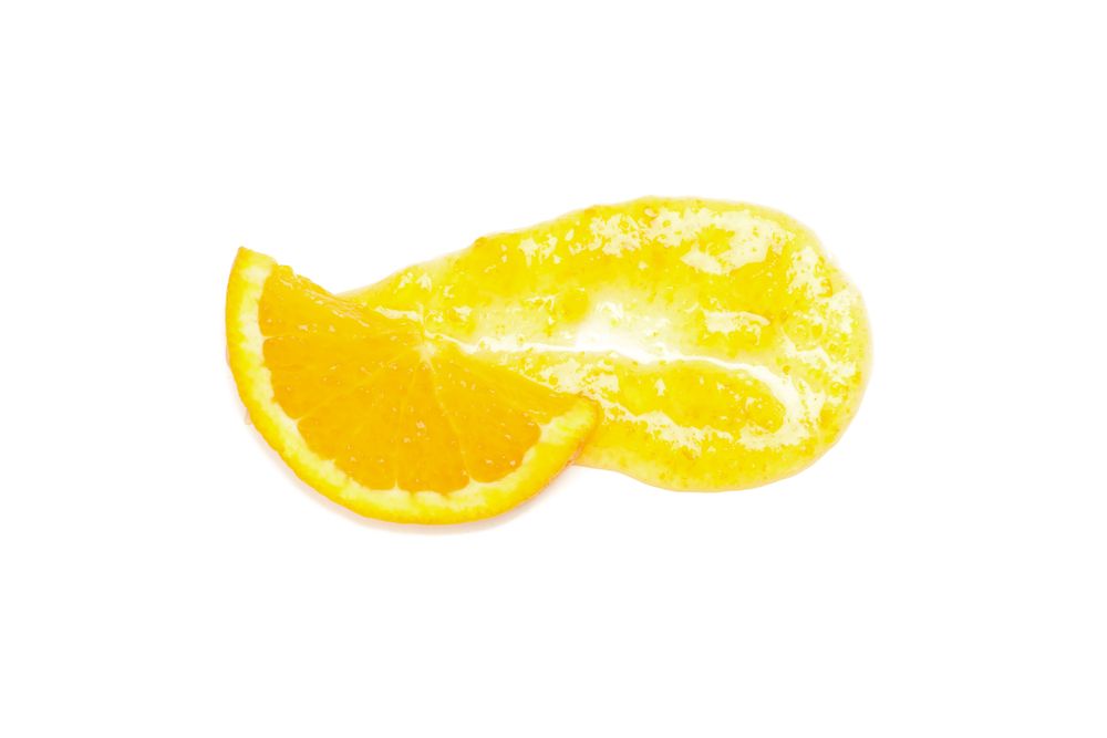 Delicious orange jam isolated on plain background
