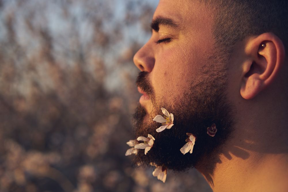 Man with flowers in beard