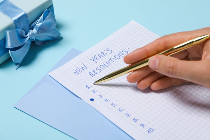 Concept of New Year Resolutions list, new year goals, close up