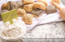 Wheat flour with banner and bread and rolls in the background 41O880
