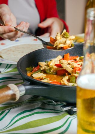 Pan with mexican food on a table