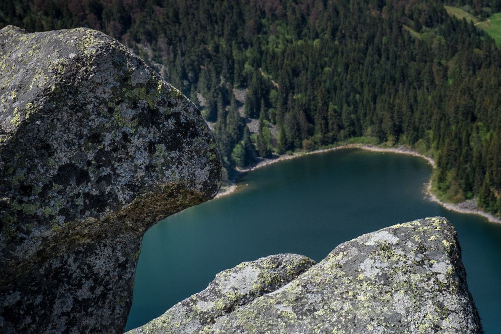 Looking down at beautiful lake in summertime from the rocks