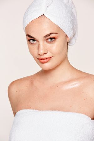 female with radiant body after cosmetic procedure