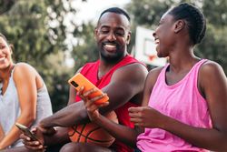 Using the smartphone on the court after a basketball game