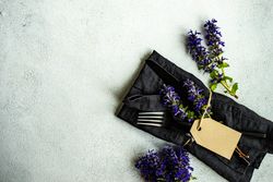 Summer table setting with blue flowers