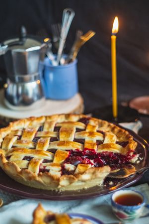 Oven-baked cherry pie decorated with lattice topping