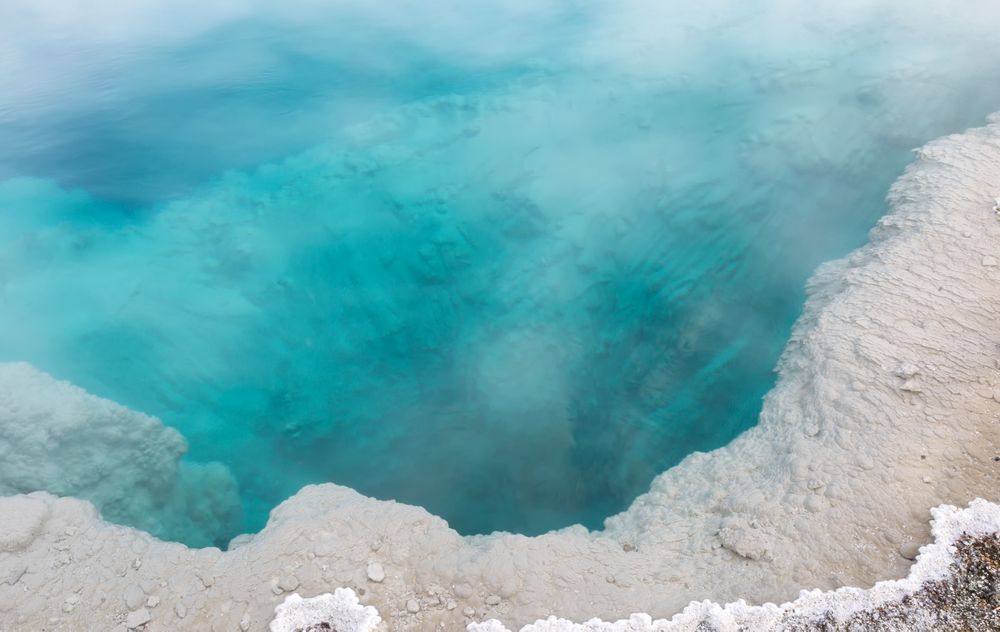 Deep aqua color hot spring in Yellowstone Park