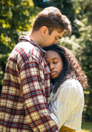 First love: young lovers in the park