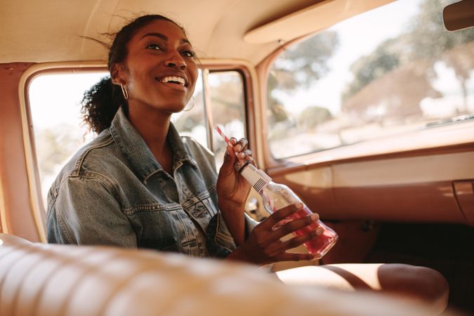 Attractive Black woman going on a road trip