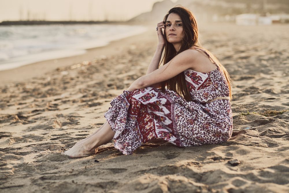 Woman with dress at the beach