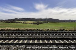 Railway tracks and sunny spring nature scenery 0v7po5