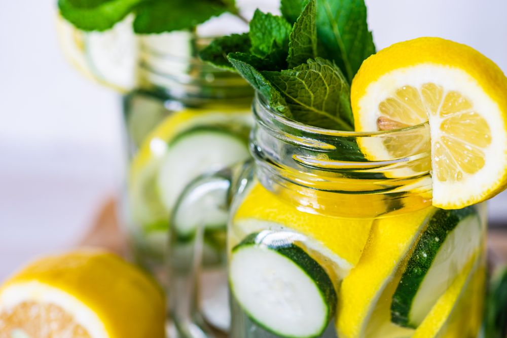 Close up of detox drink with lemon, mint and cucumber