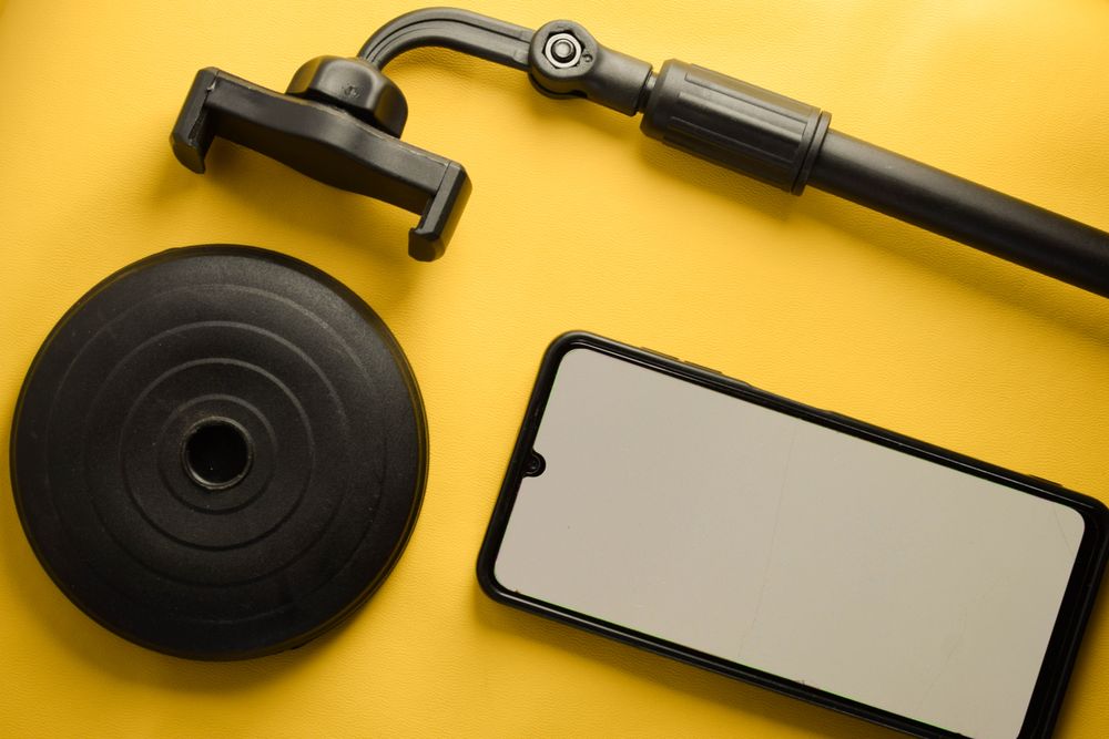 Mock up phone and stand on yellow background