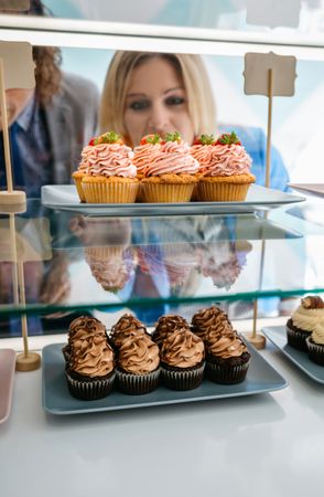 Couple choosing a cupcake