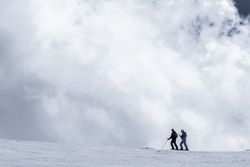 Men skiing on winter day