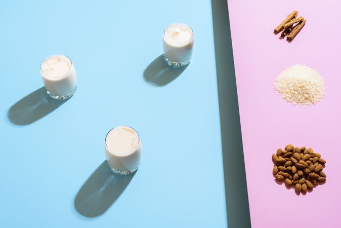 Three horchata glasses and ingredients