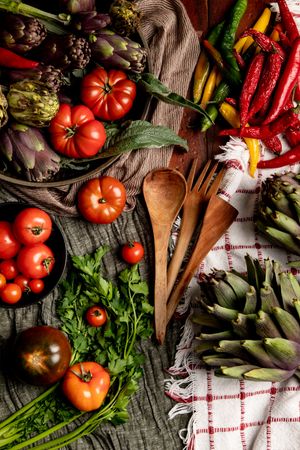 Assorted vegetables and napkins on table