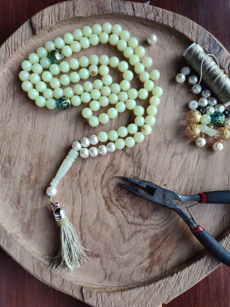 Praying beads, pliers, and strings
