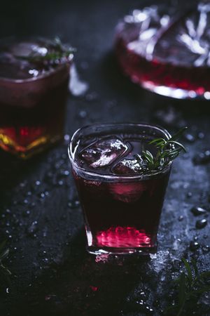 Glasses and carafe with red wine on table
