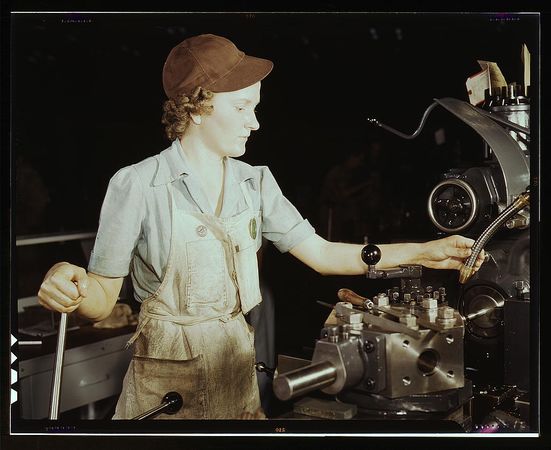 Fort Worth, TX, USA - 1942: Young woman working at Consolidated Aircraft Corp