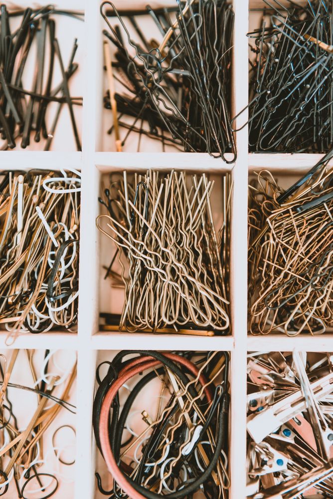 Sets of pins in boxes