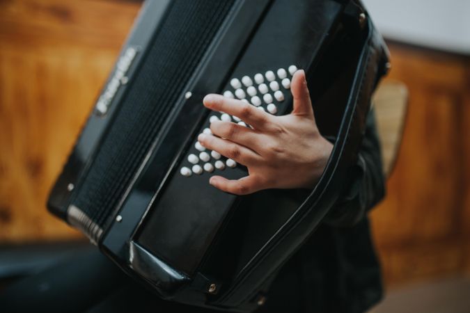 Close up of student playing accordion