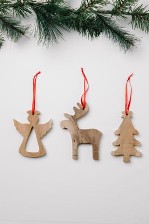 Christmas wooden cutout ornament on light background