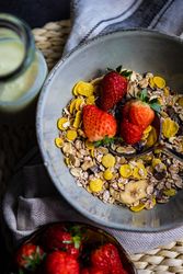 Top view of healthy breakfast of oats and strawberry