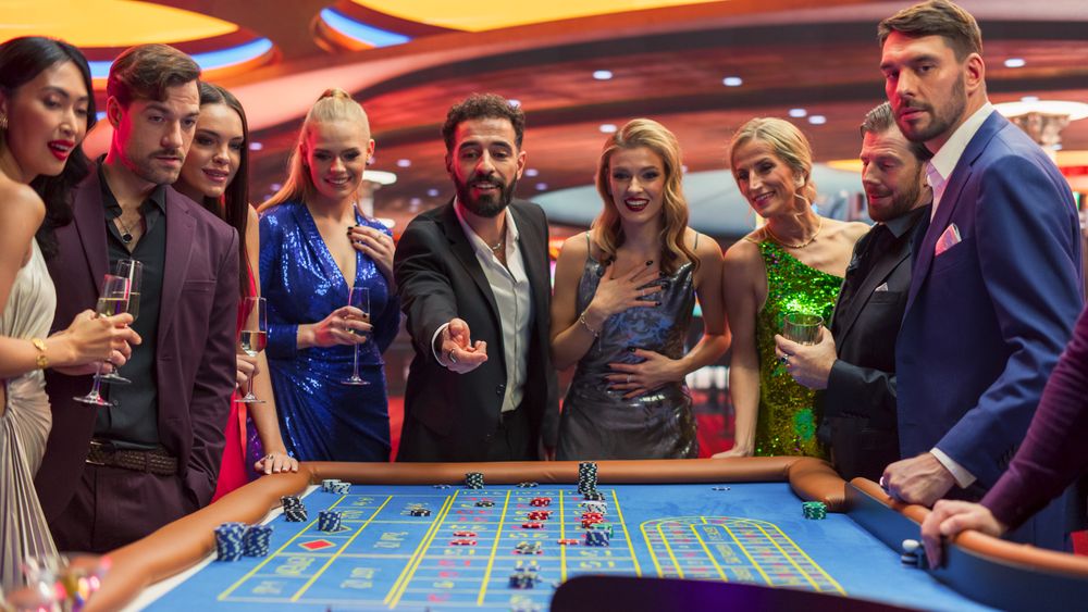 Successful Men and Women Partying in a Luxurious Casino.
