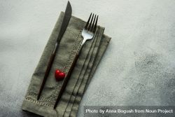 Heart decoration on grey napkin and cutlery 4mWW1Q