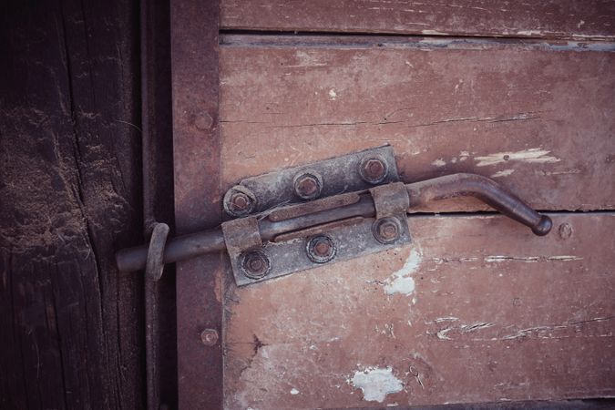 Old door of barn with latch