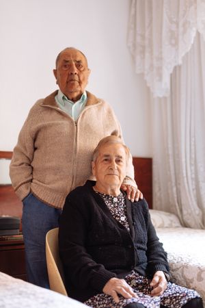 mature couple in interior of their house