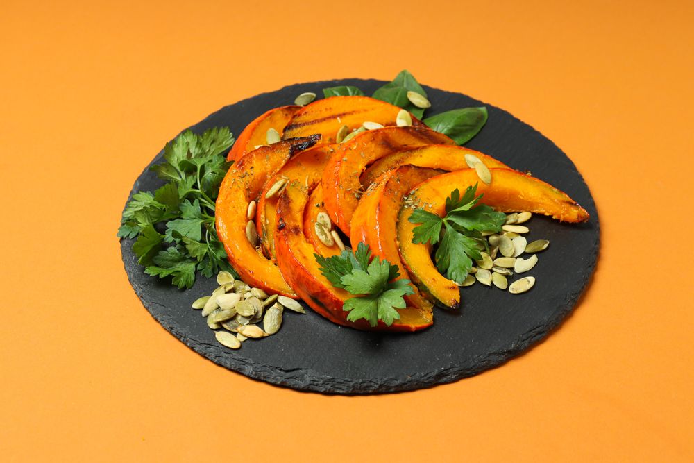 Concept of tasty homemade dish - baked pumpkin