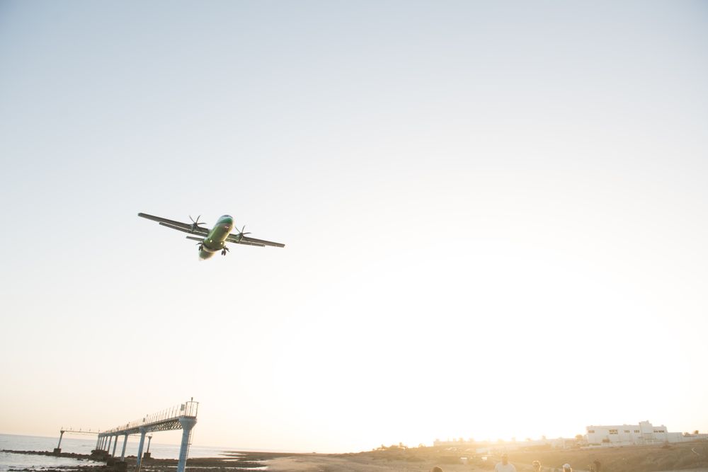 Plane behind security fence