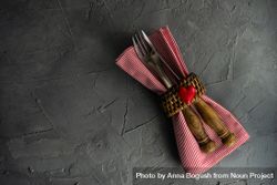 Valentine's day concept with silverware wrapped with napkin ring and heart 48BBGJ