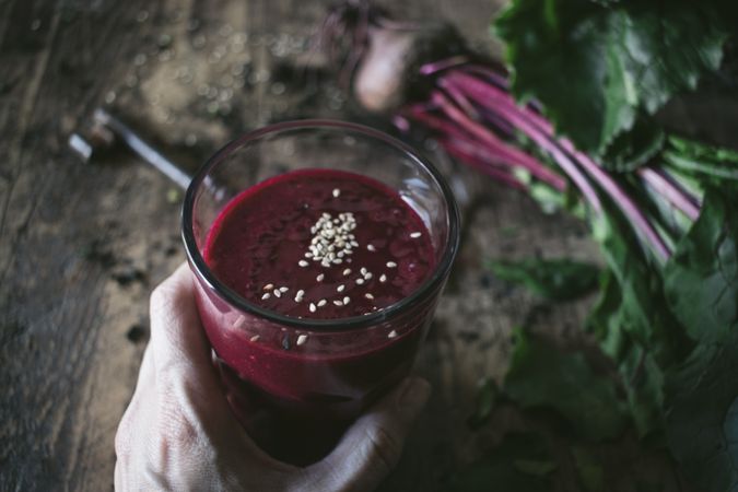 Beetroot and fresh smoothie on wooden table