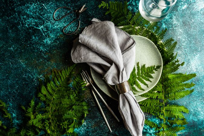Summer rural table setting with fern